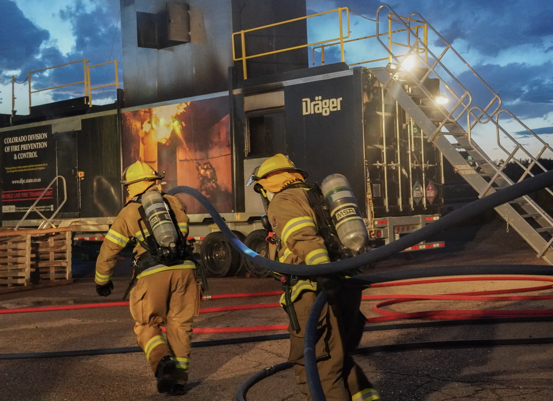 Firefighters train on the Mobile Live Fire Training Unit